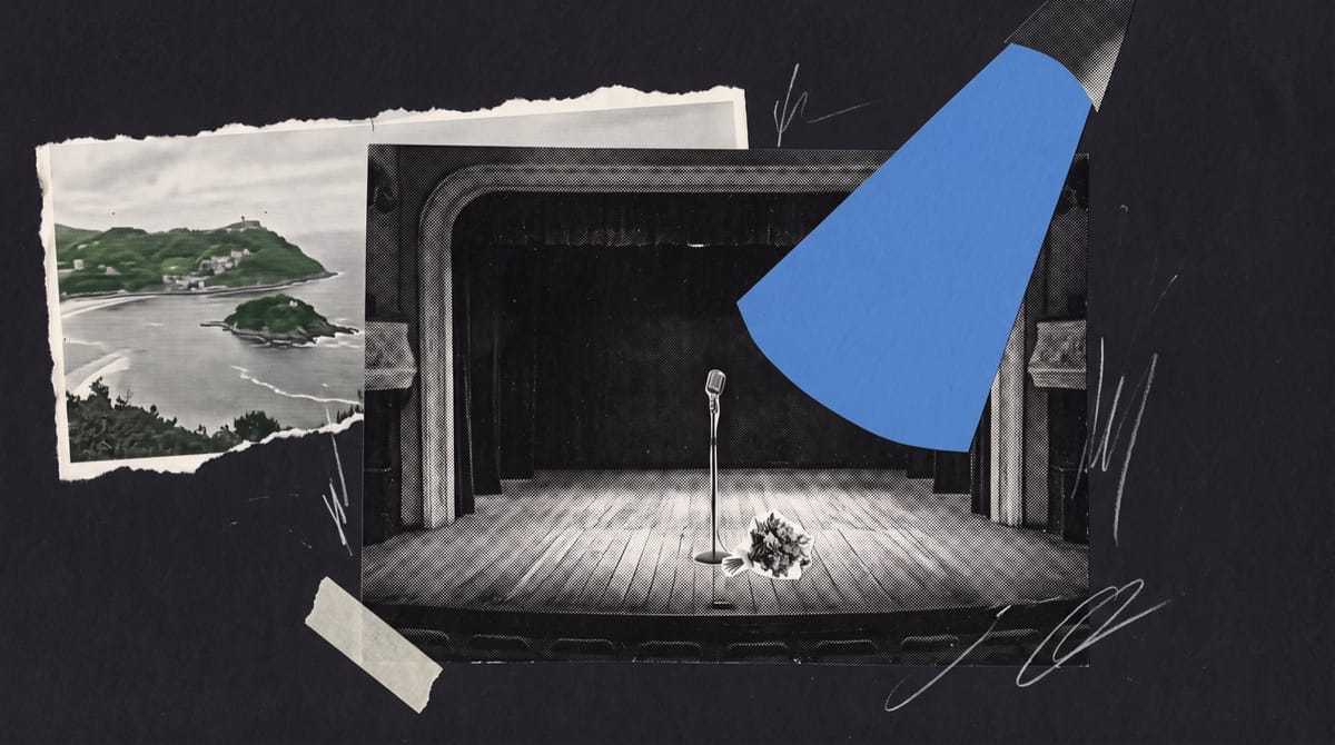 A black-and-white cutout of an empty theatre stage with a single microphone stand and a small bouquet of flowers laid on the boards, under a large hand-cut blue paper spotlight cone.