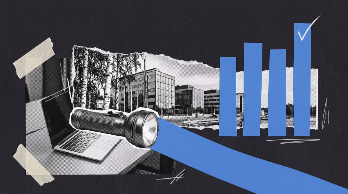 A black-and-white cutout of an old-fashioned hand-held torch, switched on, lying on a desk beside an open laptop, its beam drawn as a cone of hand-cut blue paper cutting across the dark.