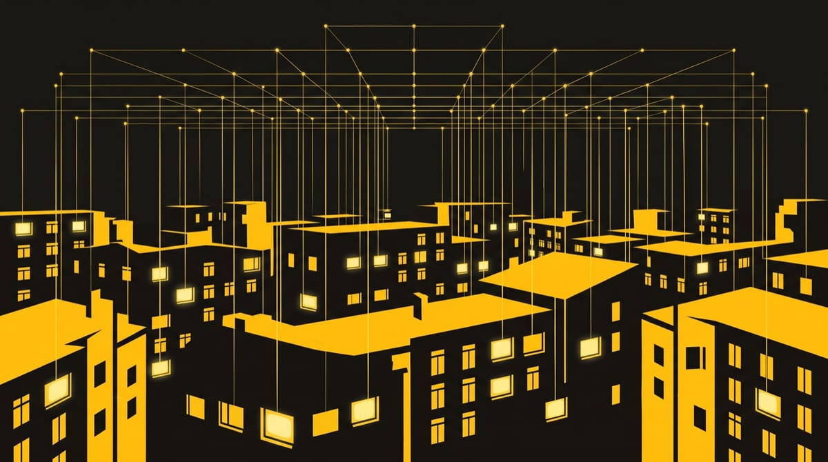 A night street of apartment blocks seen from high above, dozens of windows flickering with the light of television screens.