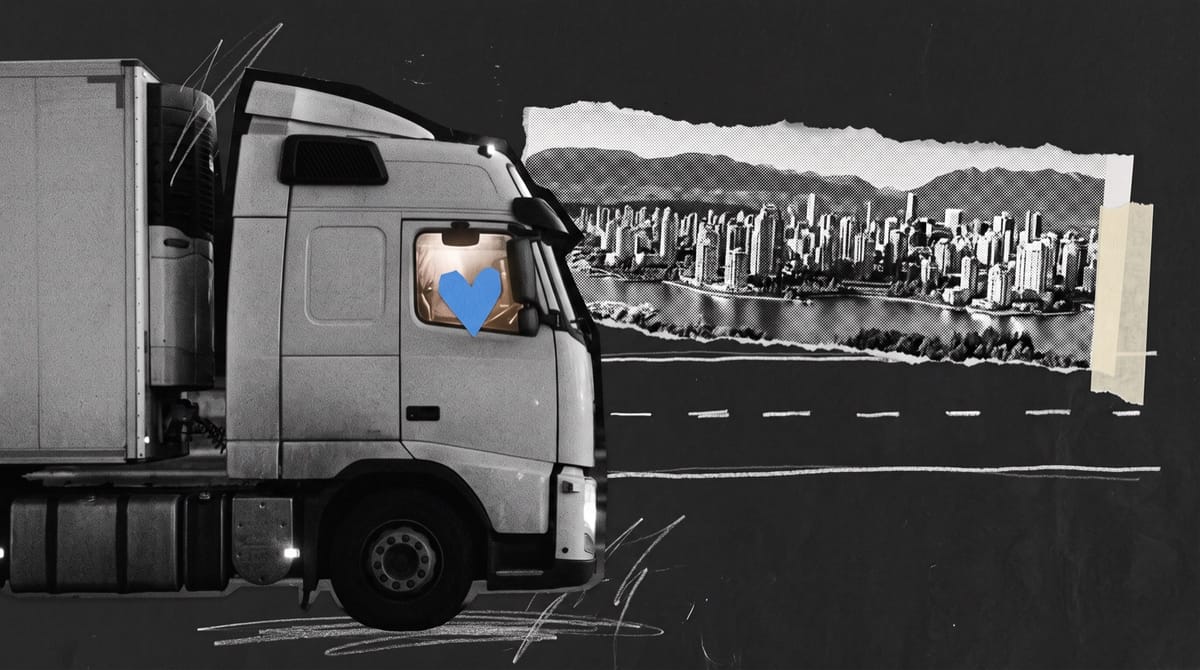 Paper collage of a truck cab at night on an empty motorway, a small blue paper heart on its dashboard, before a torn strip of lakeside city skyline and mountains.
