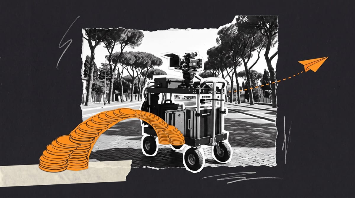 Paper collage of a film crew's camera cart on a sunlit Roman street lined with pines, an orange paper bridge of coins and a paper aeroplane overhead.