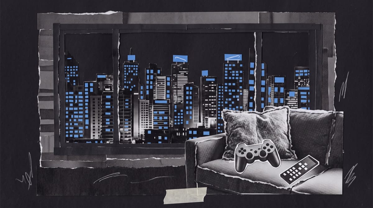 Paper collage of a night city skyline with glowing blue windows, seen past a sofa where a game controller lies on a cushion beside a television remote.