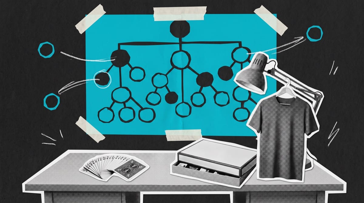 Paper collage of an office desk with fanned playing cards, a board game box and a T-shirt on a desk lamp, under a cyan organisation chart taped to the wall.
